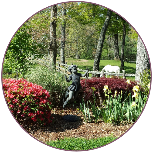 Statue Of Child In Garden